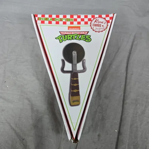 BOXED TEENAGE MUTANT NINJA TURTLES TMNT RAPH'S FAMOUS ORIGINAL SAI PIZZA CUTTER WHEEL TOOL