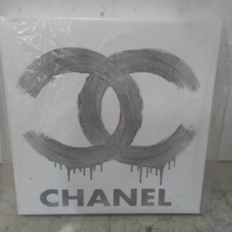 FASHION LOGO SILVER ON WHITE BY MADELINE BAKER - WRAPPED CANVAS 