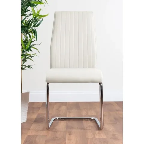 BOXED LOREN WHITE FAUX LEATHER DINING CHAIRS SET OF 2 (1 BOX)