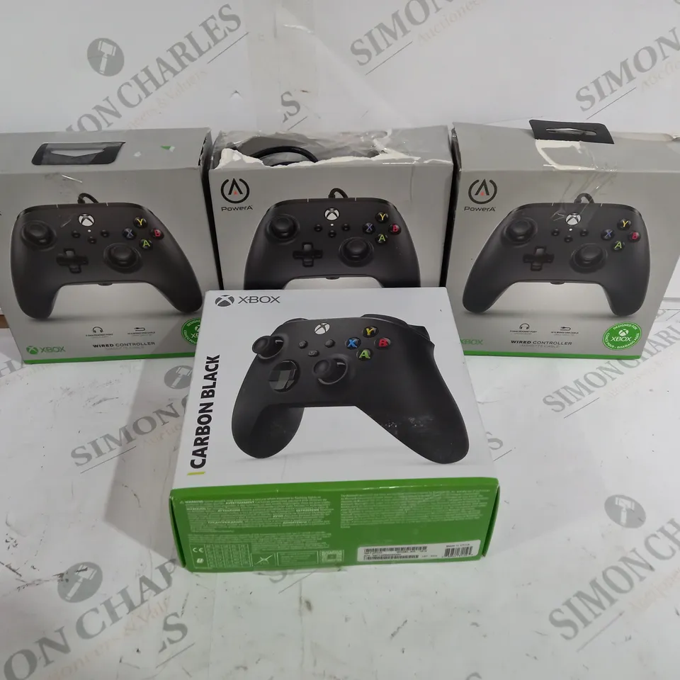 BOX OF ASSORTED XBOX CONTROLLERS IN BLACK INCLUDING THREE WIRED AND ONE WIRELESS 