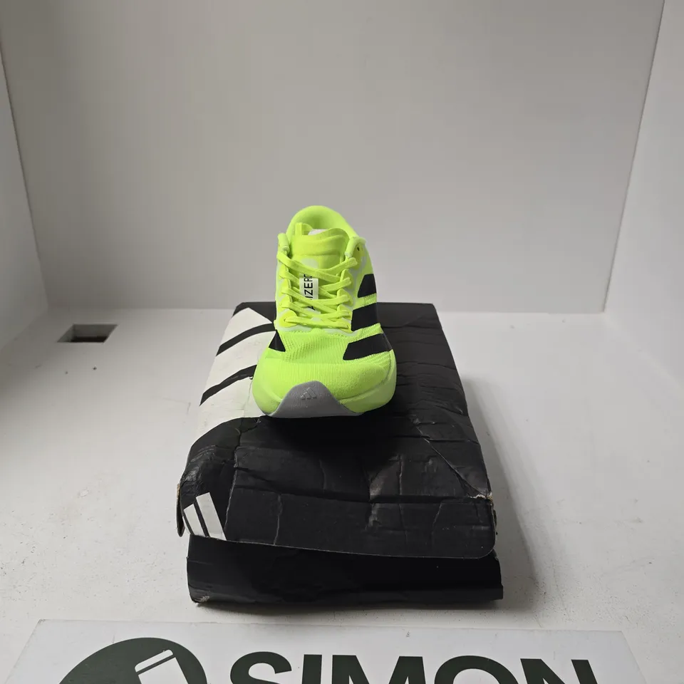 BOXED PAIR OF ADIZERO EVO TRAINERS SIZE UK 7.5