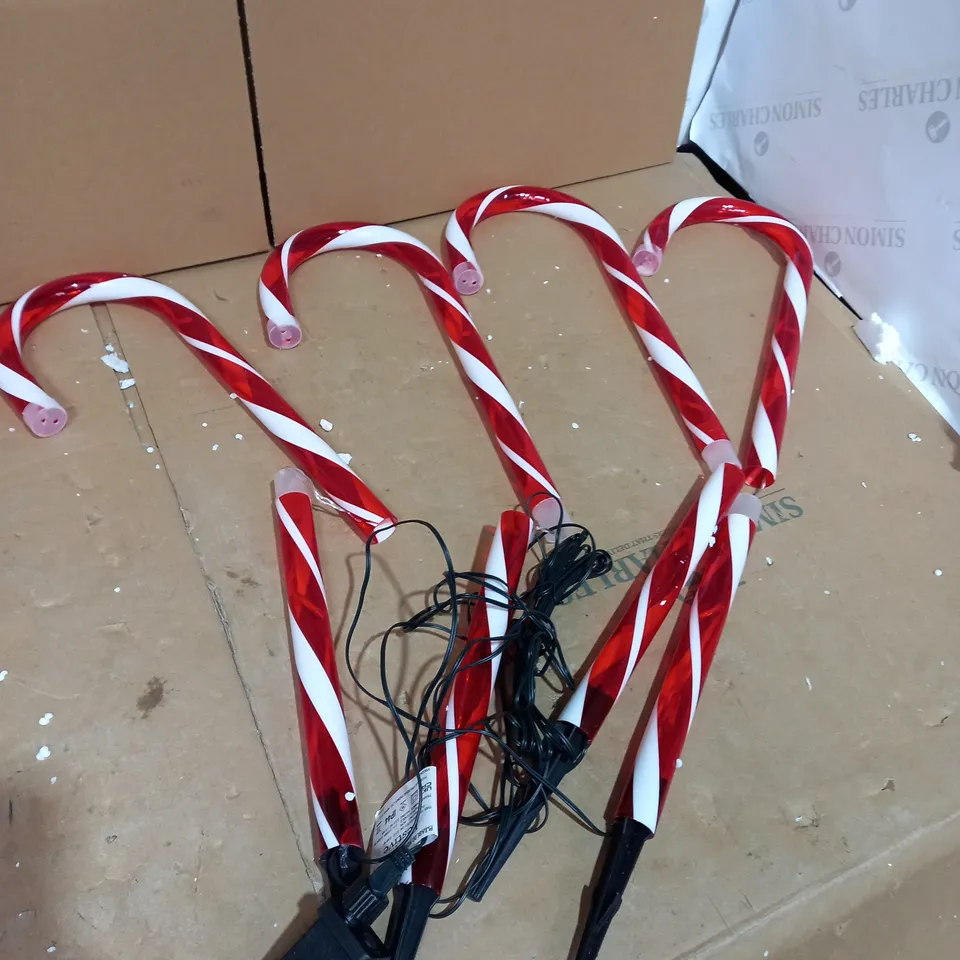 OUTLET FESTIVE SET OF 4 OUTDOOR CANDY CANE STAKES