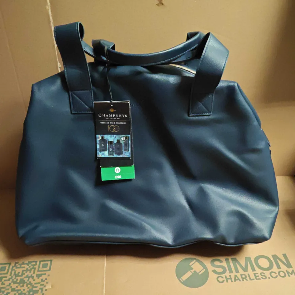 CHAMPNEYS WEEKEND BAG AND TOILETRIES INCLUDES DEODERANT AND BODY WASHES