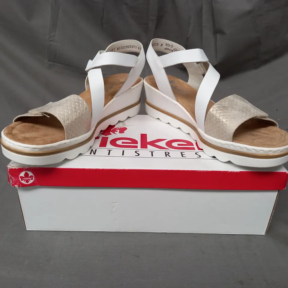 BOXED PAIR OF RIEKER STRAPPY SANDALS IN WHITE SIZE 6.5