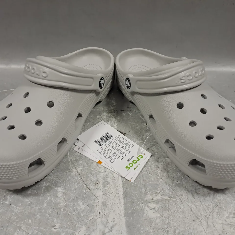 PAIR OF CROCS CLASSIC CLOGS IN GREY UK SIZE M7/W8