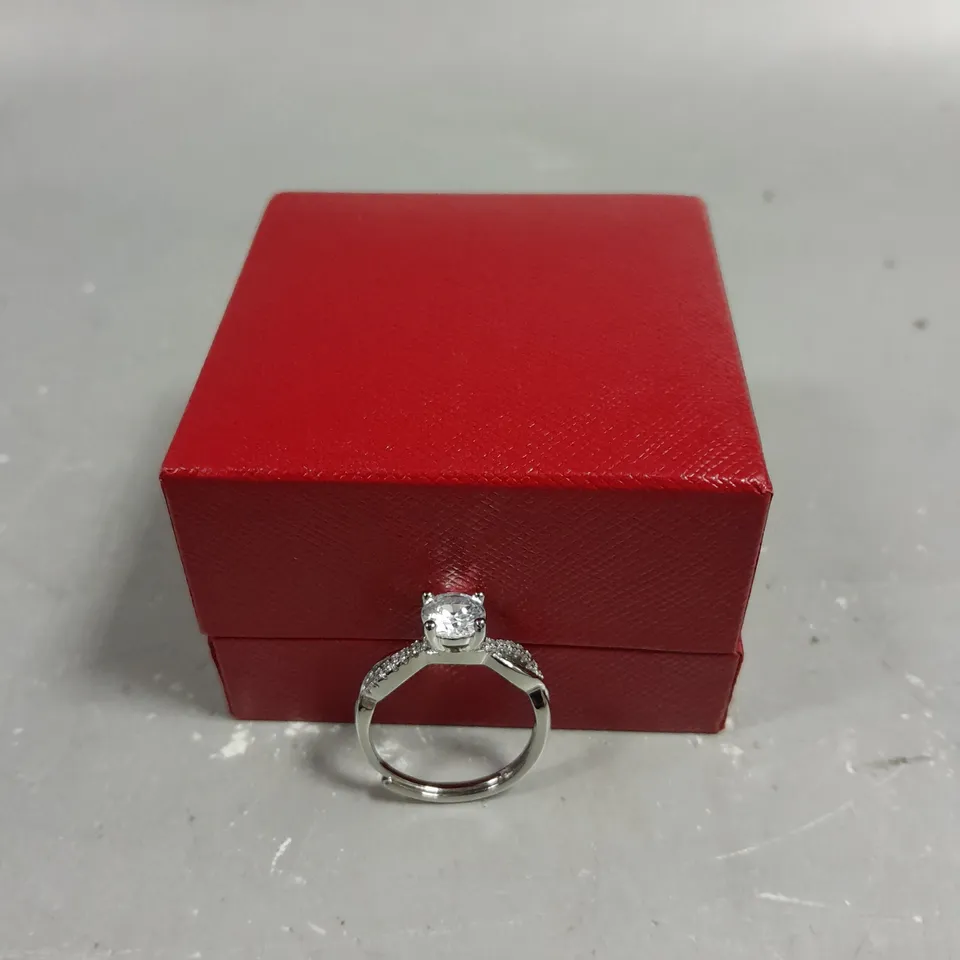 DESIGNER STONE TOPPED INFINITY RING 