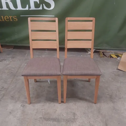 PAIR OF DESIGNER WOODEN DINING CHAIRS WITH PADDED UPHOLSTERED SEATS