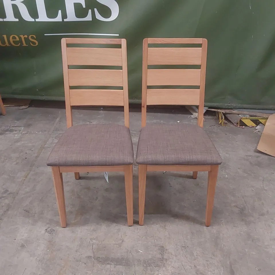 PAIR OF DESIGNER WOODEN DINING CHAIRS WITH PADDED UPHOLSTERED SEATS