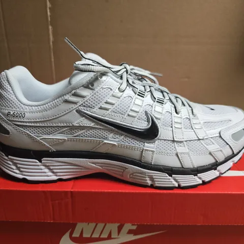 BOXED PAIR OF NIKE P-6000 TRAINERS – WHITE/METALLIC SILVER, UK 9.5 