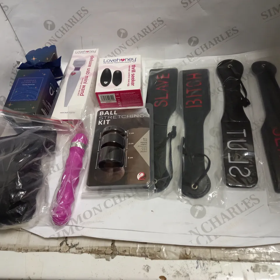 LOT OF APPROX 10 ASSORTED ADULT ITEMS TO INCLUDE LEATHER PADDLES, VIBRATORS, BONDAGE GEAR ETC