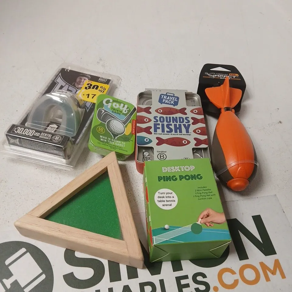 APPROXIMATELY 10 ASSORTED TOYS AND GAMES TO INCLUDE DESKTOP PING PONG, TRIVIA GAME, MOUTH GUARD ETC 
