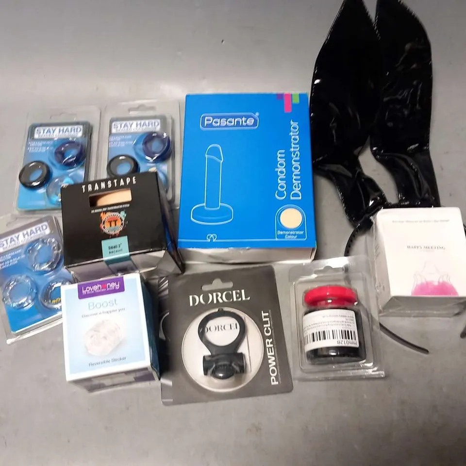 LARGE QUANTITY OF ASSORTED ADULT THEMED ACCESSORIES TO INCLUDE; PASANTE CONDOM DEMONSTRATOR, OXBALLS SPROCKET, MR MEMBER COCK RING SET AND LOVEHONEY BOOST