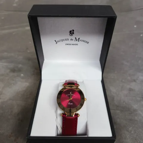 JACQUES DU MANOIR SWISS MADE QUARTZ WATCH – RED DIAL, GOLD TONE CASE, RED LEATHER STRAP