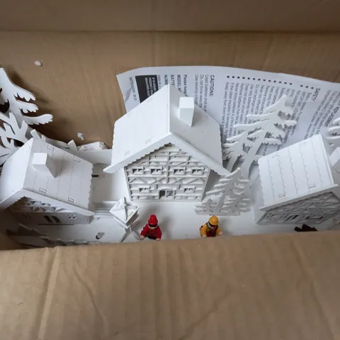 WHITE WOOD LIT VILLAGE SCENE