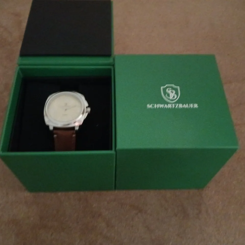 BOXED SCHWARTZBAUER QUARTZ WRISTWATCH WITH BROWN LEATHER STRAP