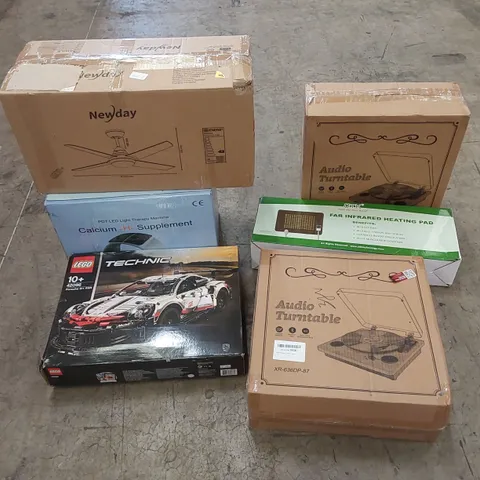 PALLET OF ASSORTED HOUSEHOLD ITEMS AND CONSUMER PRODUCTS TO INCLUDE; TURNTABLES, LEGO, HEATED PAD, GAMING CHAIR, CEILING FAN WITH LIGHT ETC
