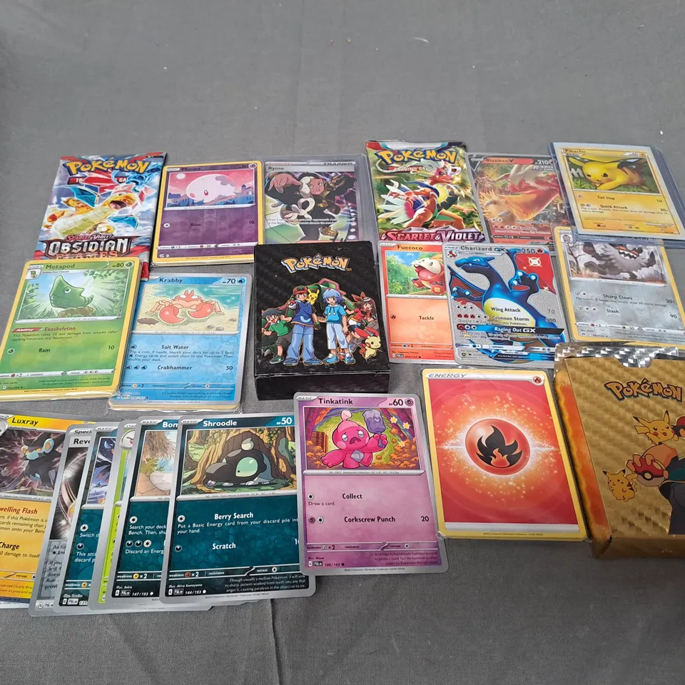 LARGE ASSORTEMENT OF COLLECTABLE POKMON TRADING CARDS