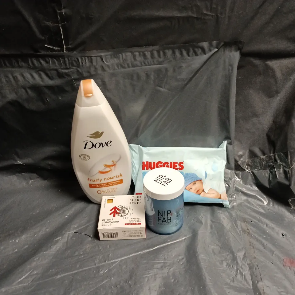 APPROXIMATELY 15 ASSORTED ITEMS OF COSMETICS INCLUDING DOVE NORISH BODY WASH, HUGGIES PURE WIPES, NIP AND FAB CLEANSING PADS AND THE BLACK STUFF IRISH SOAP