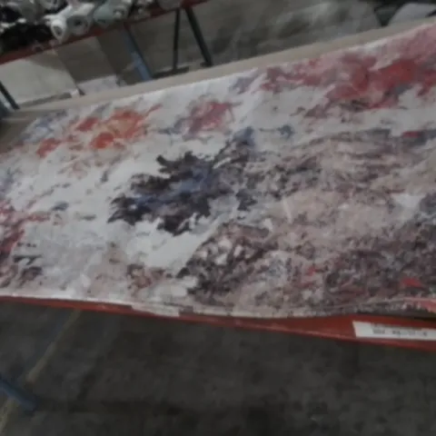 DESIGNER RUG WITH VARIED COLOUR PATTERN 138X76CM
