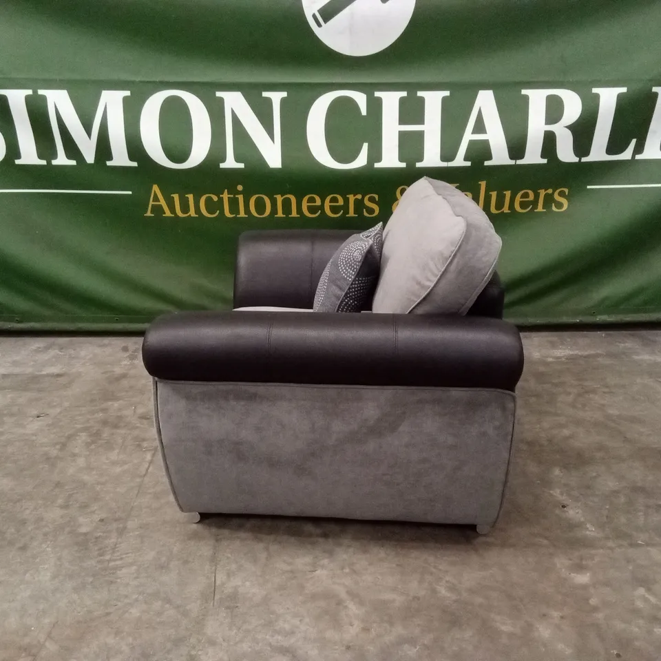 DANUBE FABRIC/FAUX LEATHER ARMCHAIR RRP £499