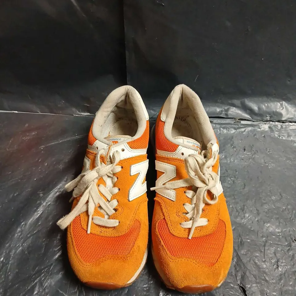 NEW BALANCE ORANGE SNEAKERS -UK SIZE UNSPECIFIED 