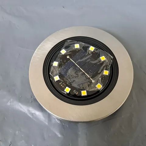 8 BELL + HOWELL SOLAR DISK LIGHTS