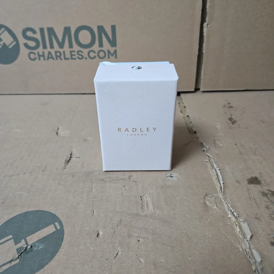 RADLEY LONDON PINK WRISTWATCH WITH DOG DESIGN. BOXED