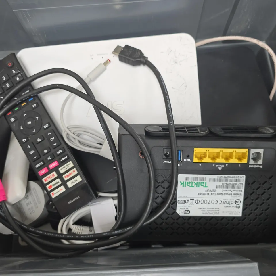 APPROXIMATELY 12 ASSORTED HOUSEHOLD ITEMS TO INCLUDE ROUTERS, CABLES, REMOTES, ETC