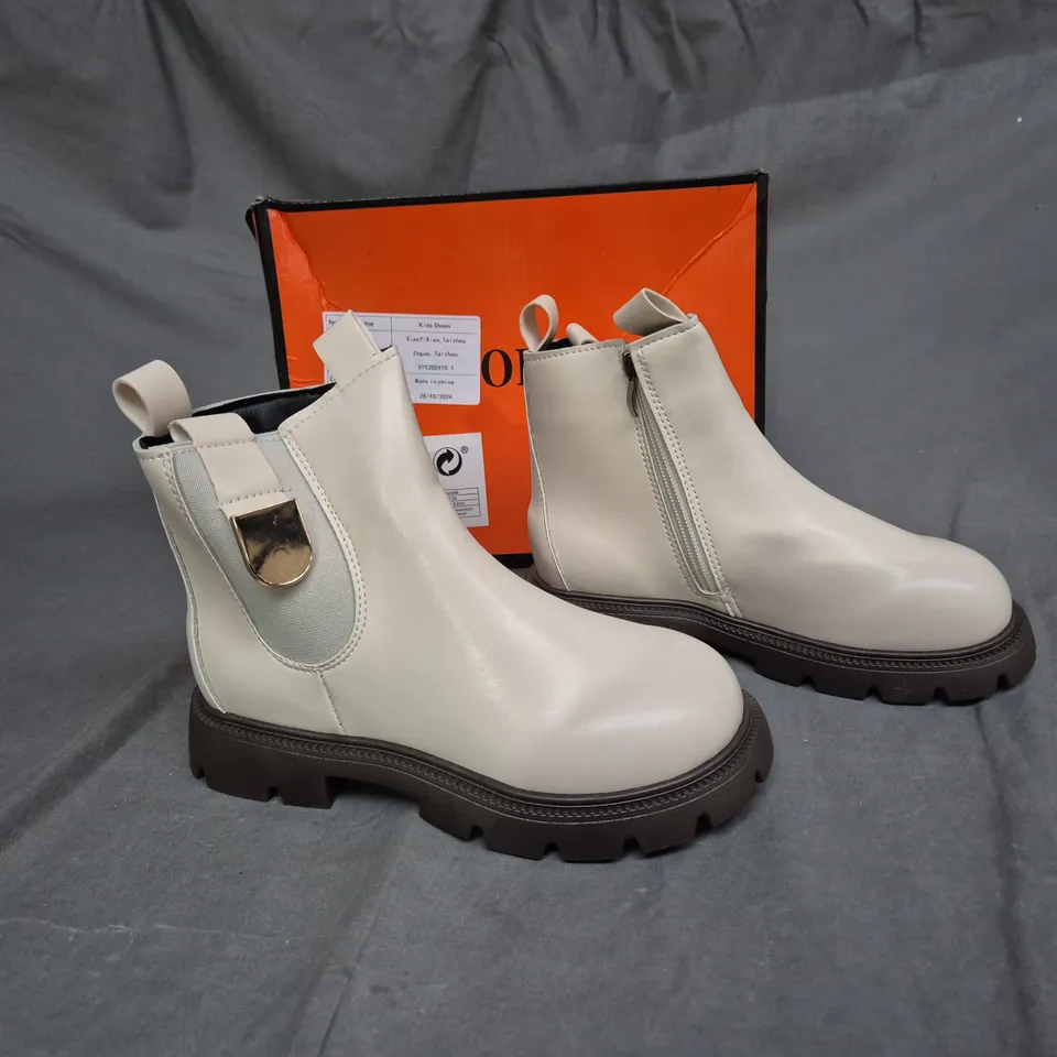 BOXED PAIR OF OPINTX CREAM BOOTS - SIZE EUR 35