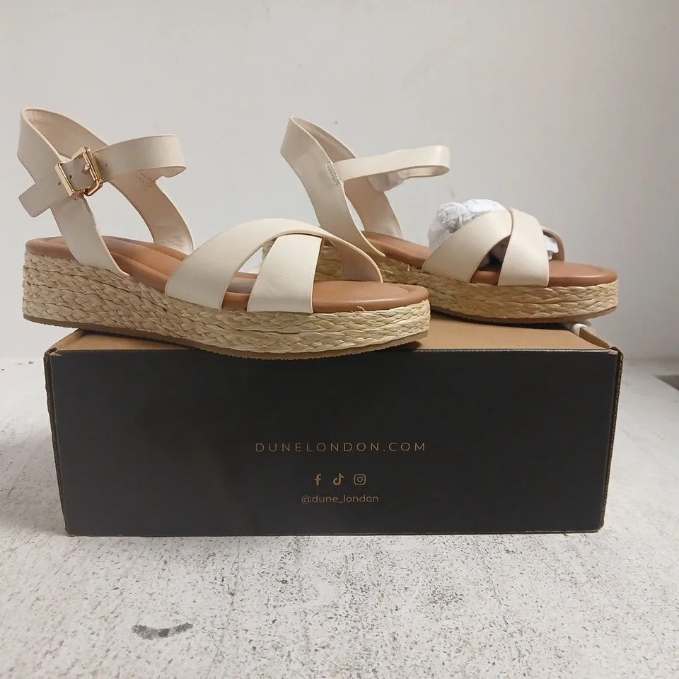 BOXED PAIR OF DUNE LONDON CROSS STRAP LOW WEDGE SANDALS IN CREAM SIZE 5