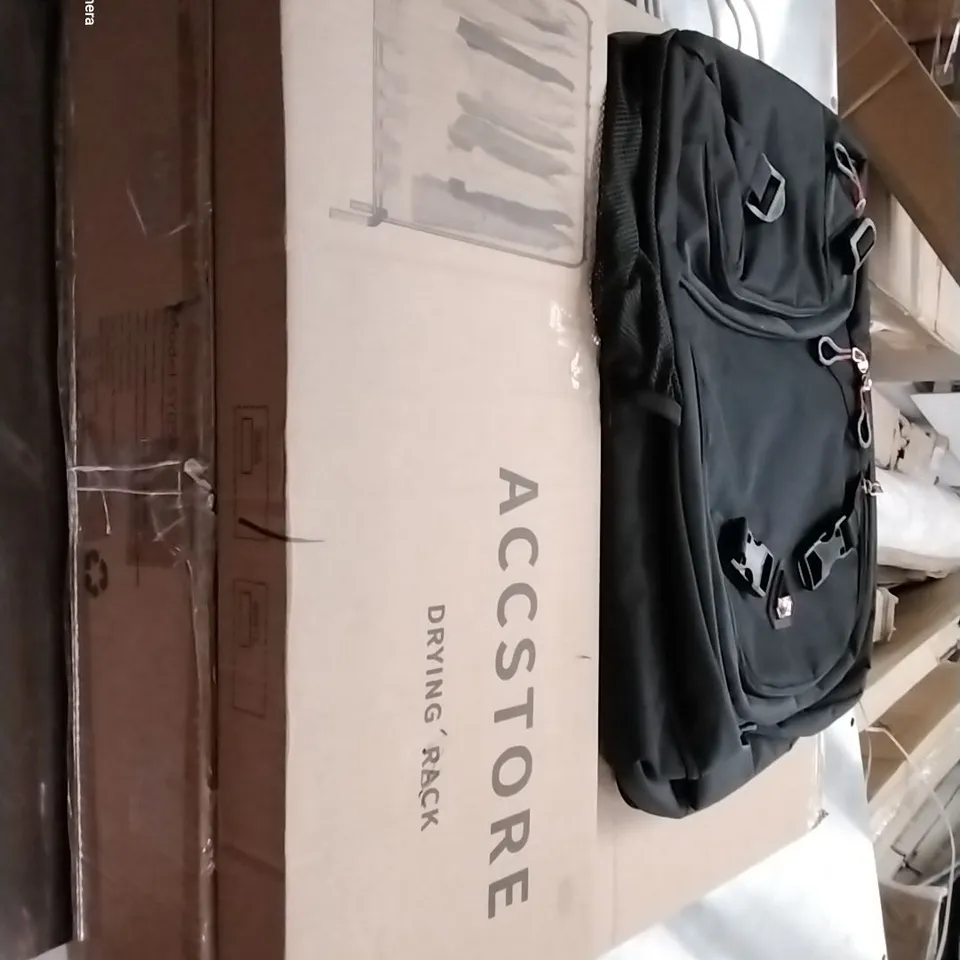 PALLET OF ASSORTED HOUSEHOLD ITEMS TO INCLUDE BOXED DESK, FIRE PIT, KIDS SCOOTER AND BACKPACK
