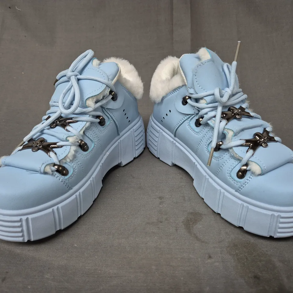 BOXED PAIR OF KOI GLACIAL BITES FLUFFY TRAINERS IN BABY BLUE UK SIZE 3