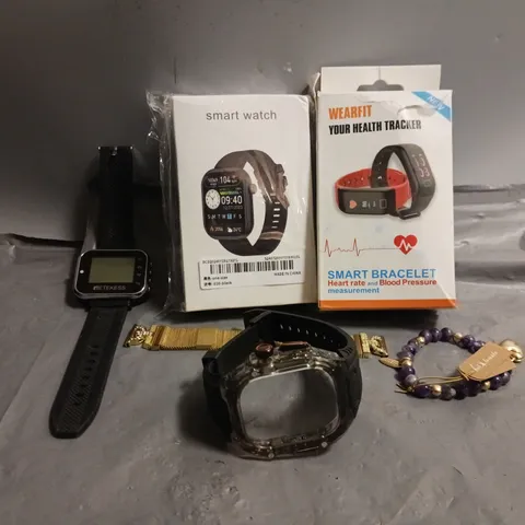 APPROXIMATELY 12 ASSORTED ITEMS TO INCLUDE - WEARFIT SMART BRACELET , SMART WATCH , BRACELET ETC