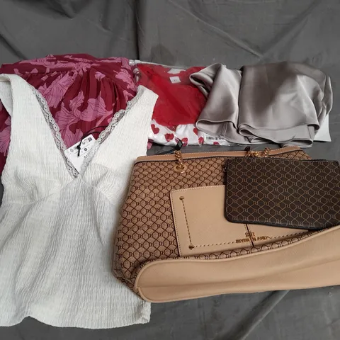 APPROXIMATELY 20 ASSORTED CLOTHING ITEMS IN VARIOUS SIZES AND STYLES TO INCLUDE - DRESS, SKIRT, BAG, ETC
