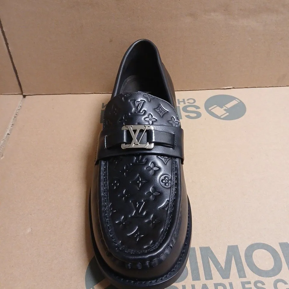 PAIR OF LOUIS VUITTON PARIS MONOGRAM LEATHER LOAFERS – 11
