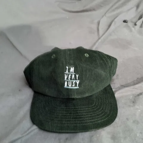 DARK GREEN CORDUROY CAP WITH WHITE 'I'M VERY BUSY"