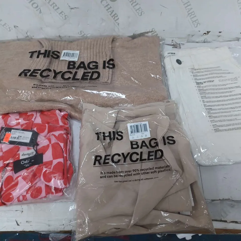 LARGE QUANTITY OF ASSORTED CLOTHING TO INCLUDE SHIRTS, SWEATERS, SKIRTS, ETC