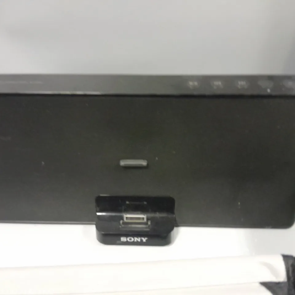 LOT OF ASSORTED ITEMS TO INCLUDE SONY DOCKING STATION, LAPTOP BAGS, TALKING CALORIE COUNTER AND BOXED SHOES