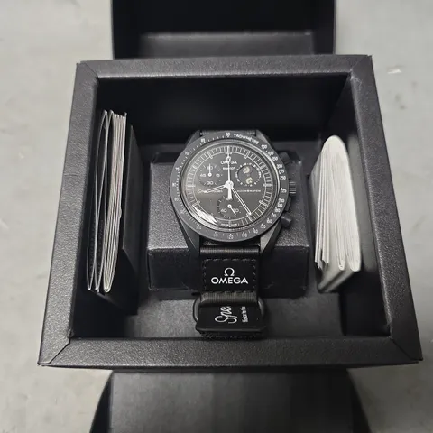 BOXED SWATCH X OMEGA MISSION TO THE MOON PHASE WATCH