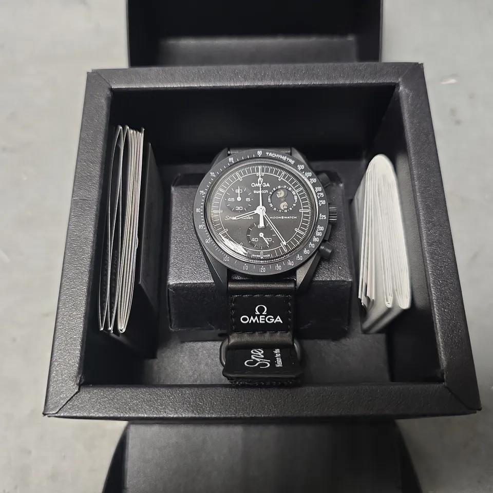 BOXED SWATCH X OMEGA MISSION TO THE MOON PHASE WATCH