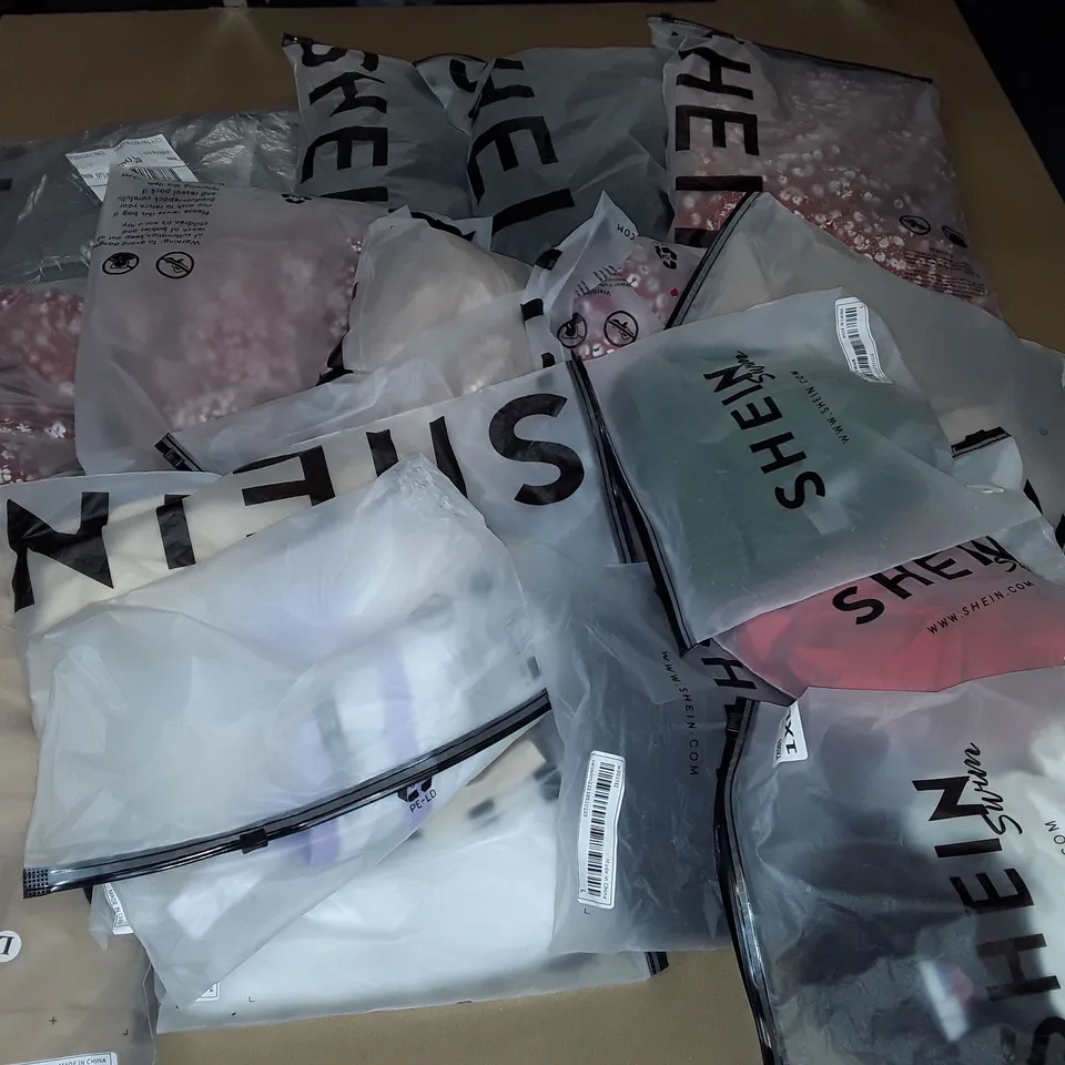 LOT OF APPROXIMATELY 22 ASSORTED SHEIN CLOTHING ITEMS IN VARIOUS SIZES