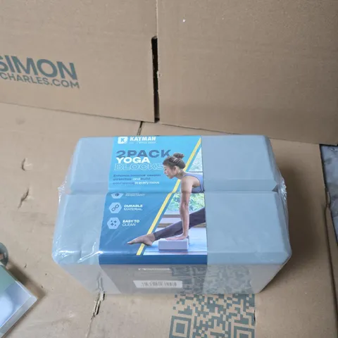 BOX OF APPROXIMATELY 15 ASSORTED HOUSEHOLD ITEMS INCLUDING YOGA BLOCKS , PASSPORT COVER AND TRAVEL PILLOW 