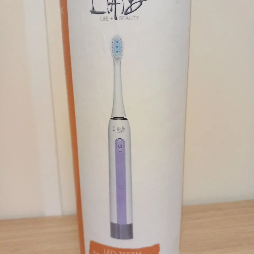 BOXED L.A.B. LIFE + BEAUTY LED TEETH WHITENING SONIC TOOTHBRUSH