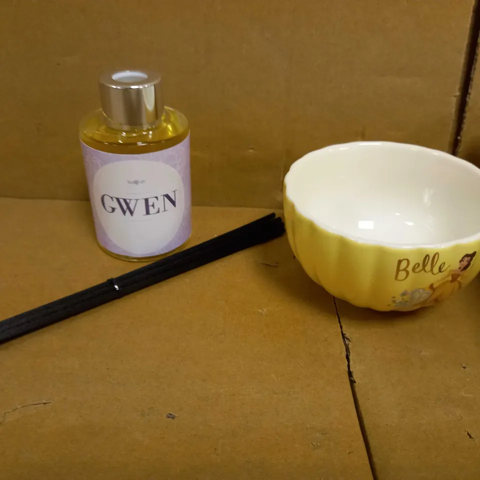 BOX OF 2 ITEMS TO INCLUDE BLACK LILY AND POMEGRANATE REED DIFFUSER AND DISNEY PRINCESS TEA CUP AND SAUCER