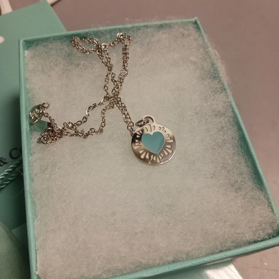 TIFFANY&CO NECKLACE IN SILVER AND TEAL HEART DESIGN INCLUDES BOX, POUCH, POLISHING CLOTH AND GIFT BAG
