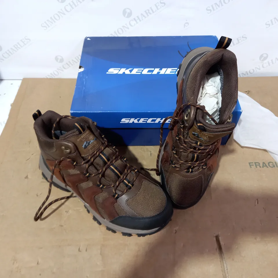 BOXED PAIR OF SKECHERS BROWN BOOTS - SIZE 10