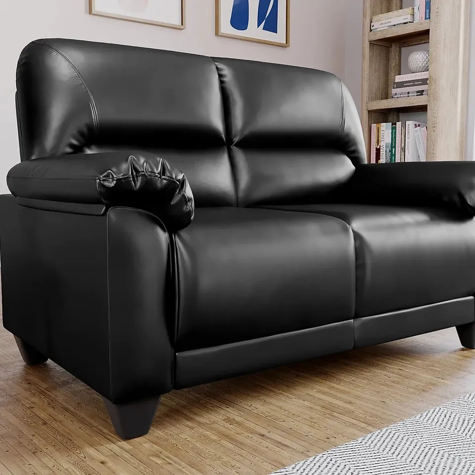 BOXED DESIGNER KENTON BLACK LEATHER TWO SEATER SOFA (1 BOX)