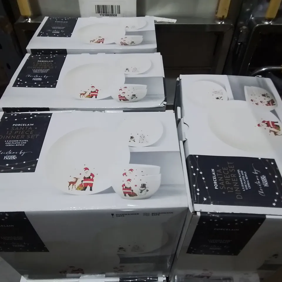 LOT OF 4 BOXED PORCELAIN SANTA 12-PIECE DINNER SET