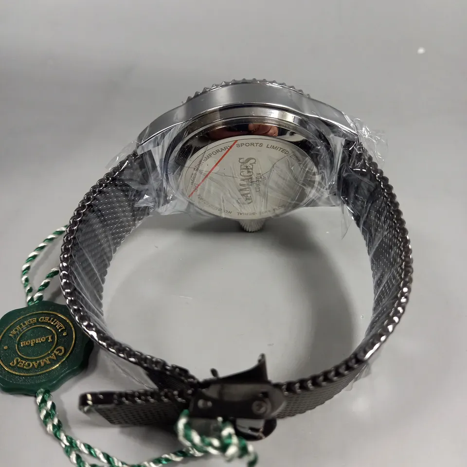 BOXED GAMAGES CONTEMPORARY SPORTS STEEL BLACK DIAL WATCH 