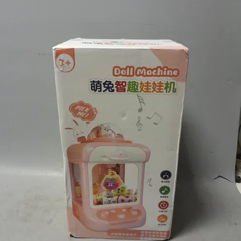 BOXED UNBRANDED DOLL MACHINE 